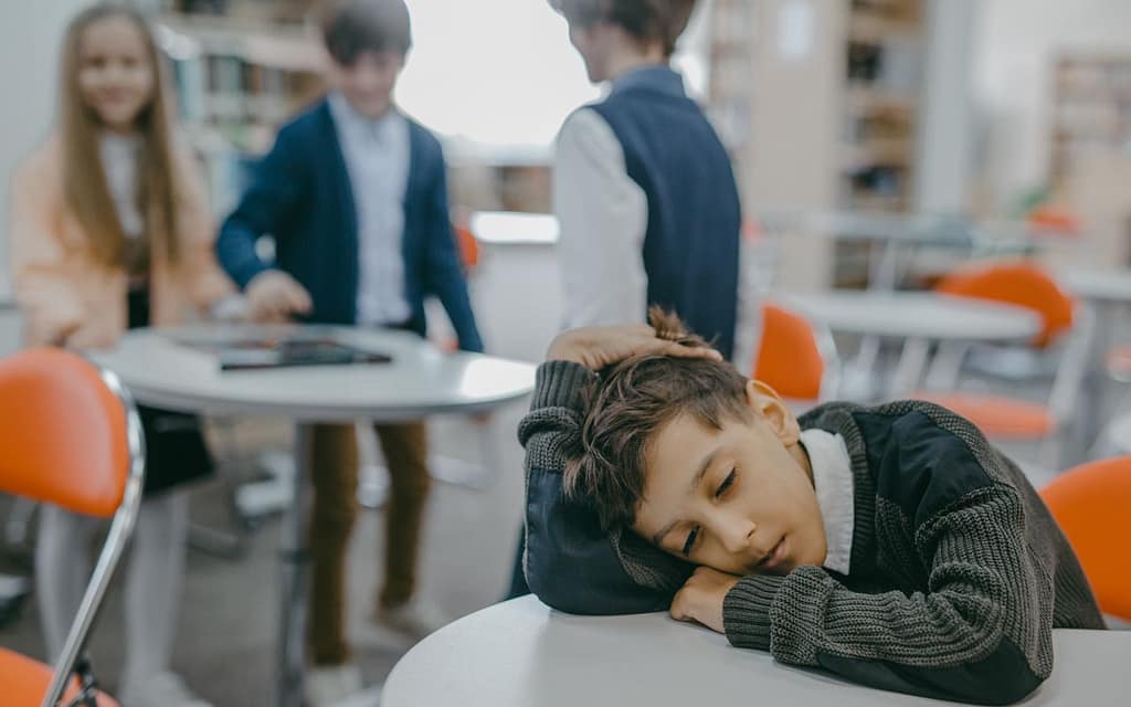 Dr. Aditi the OT - Student head down on desk away from peers - School OT decision tree, is sensory processing is affecting school participation?