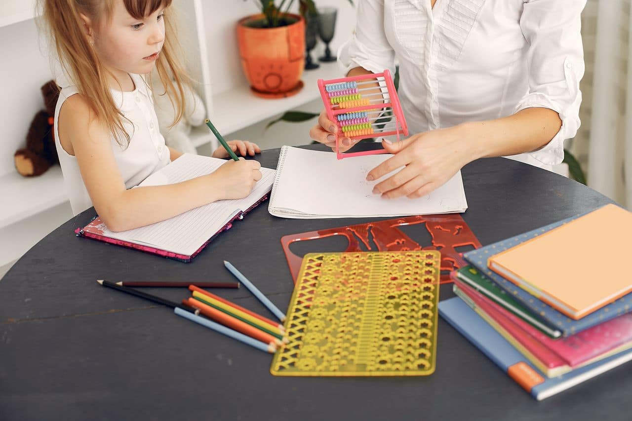 Dr. Aditi the OT - Child with therapist providing school-based occupational therapy services